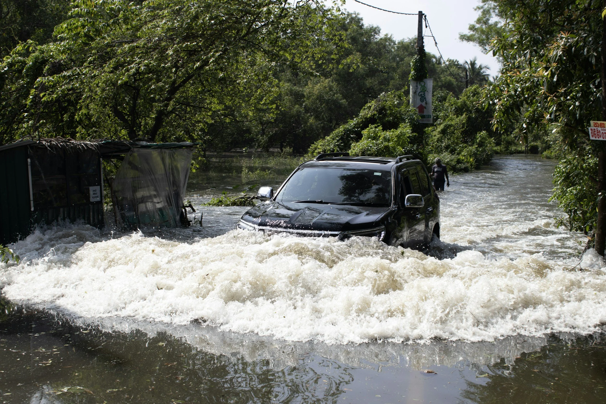 Car driving in flood