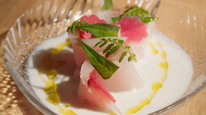 A familiar Vietnamese preparation finds a fresh expression in our Hiramasa Crudo | C&aacute; Cam X&agrave;o Dừa, a new addition to our fall menu.

Inspired by Ốc Len X&agrave;o Dừa&mdash;freshwater snails braised in aromatic coconut sauce&mdash;this 