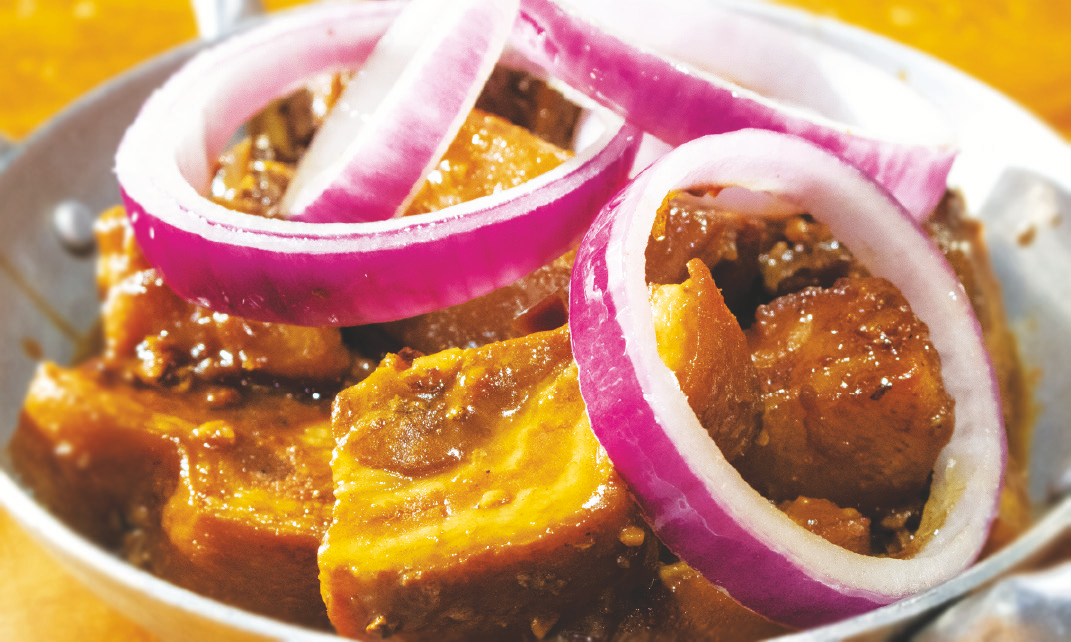 Pork belly in garlic, onions, calamansi, lemon soy sauce, and potatoes