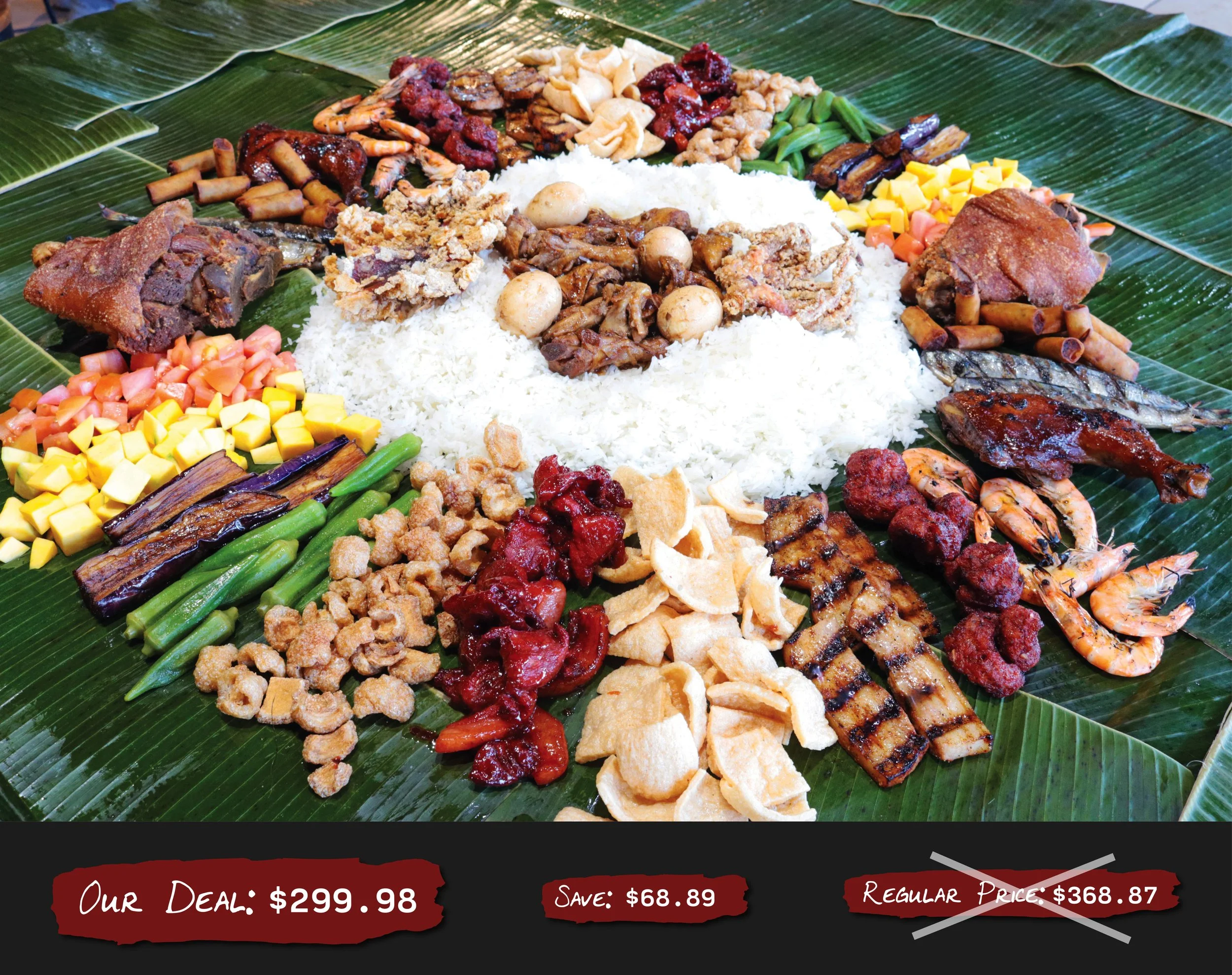 Filipino boodle fight meal on a banana leaf, with rice, grilled meats, eggplant, crispy food and others. Regular $368.87, Our Deal $299.98, Save $68.89.
