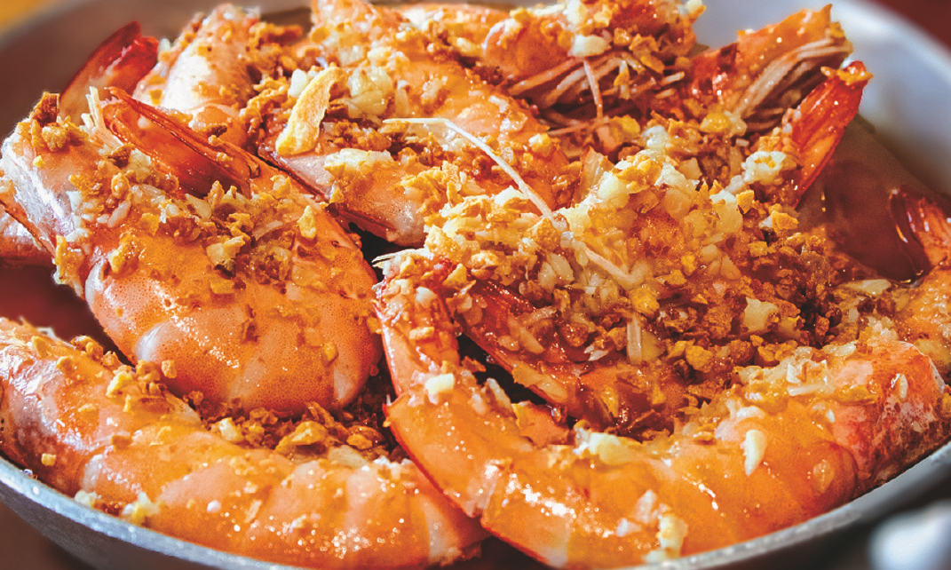 Sautéed prawns in garlic‑butter sauce
