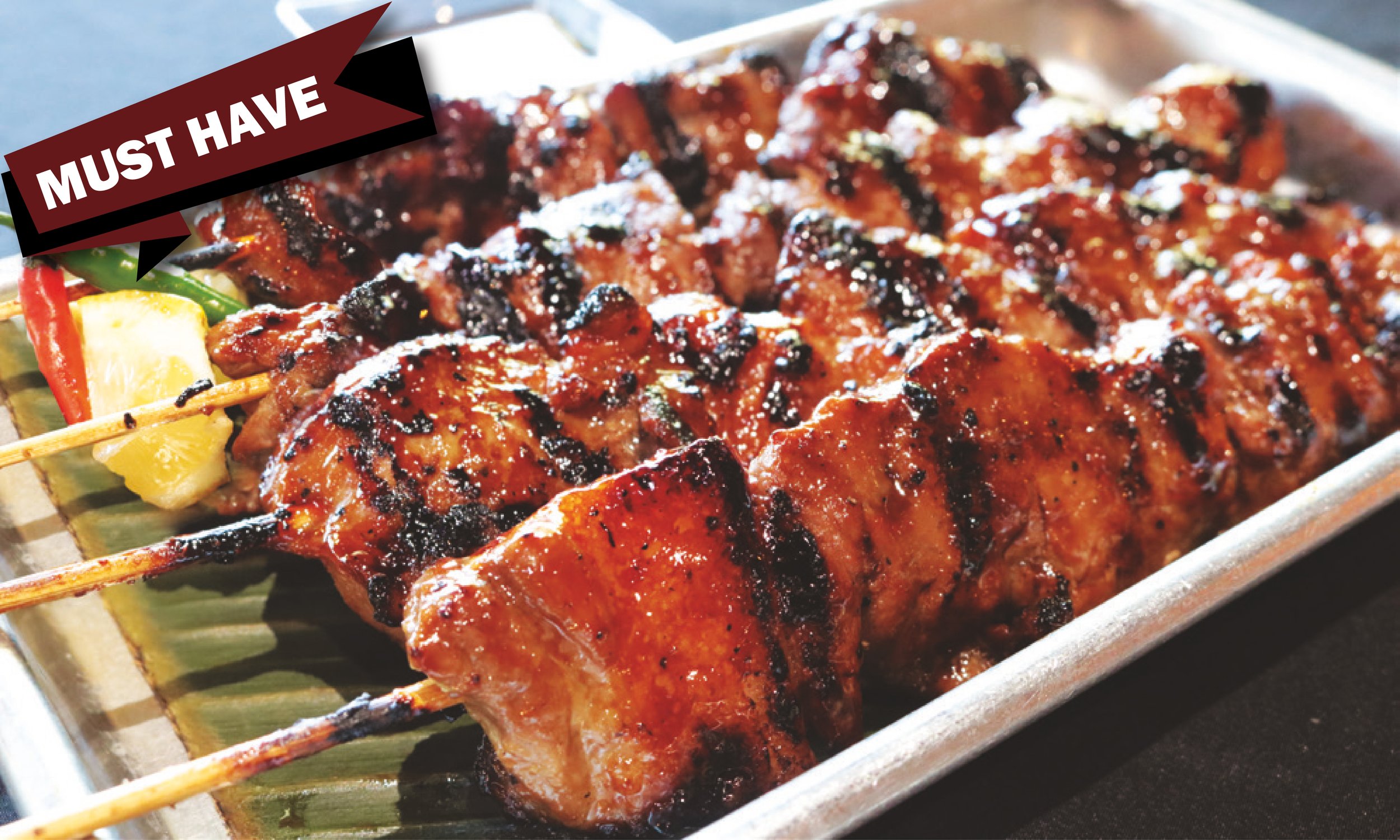 Marinated grilled pork skewers with slight char marks