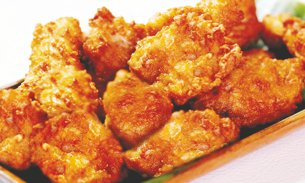 Deep‑fried wings with seasoned breading