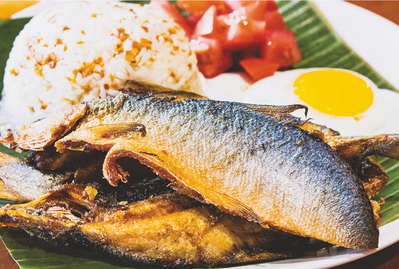 Marinated fried baby milkfish (90% boneless) served with rice, fried egg, and tomato