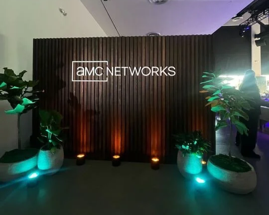 Fabricated wall with dimensional lettering welcomed guests into main presentation room