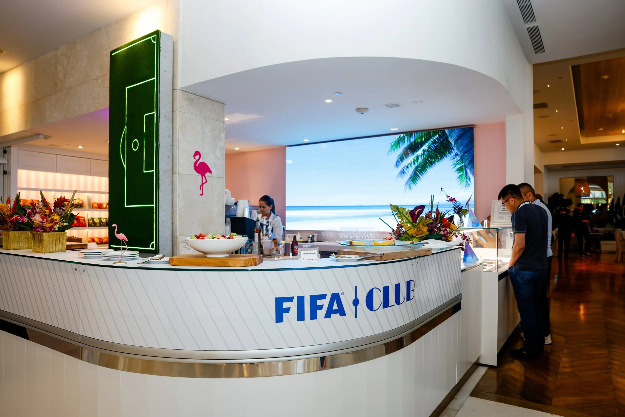 Hotel deli station takeover with vinyl graphics and custom neon pitch line work set with turf. (Grand Beach Hotel; Miami, FL)