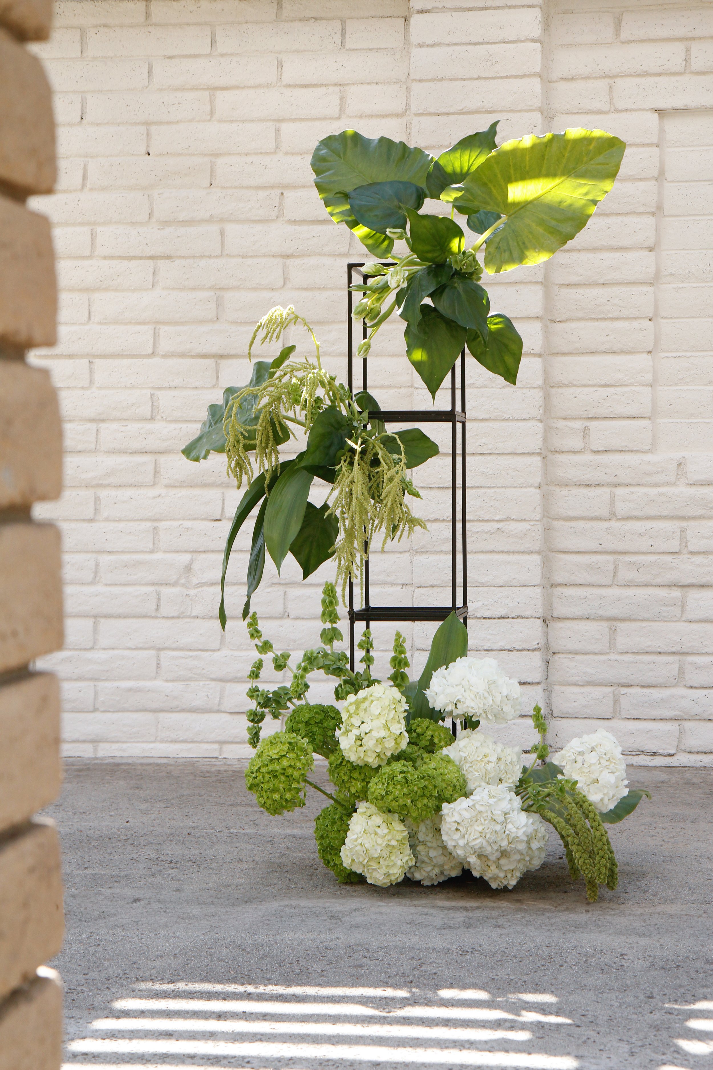 green and white modern ceremony flowers