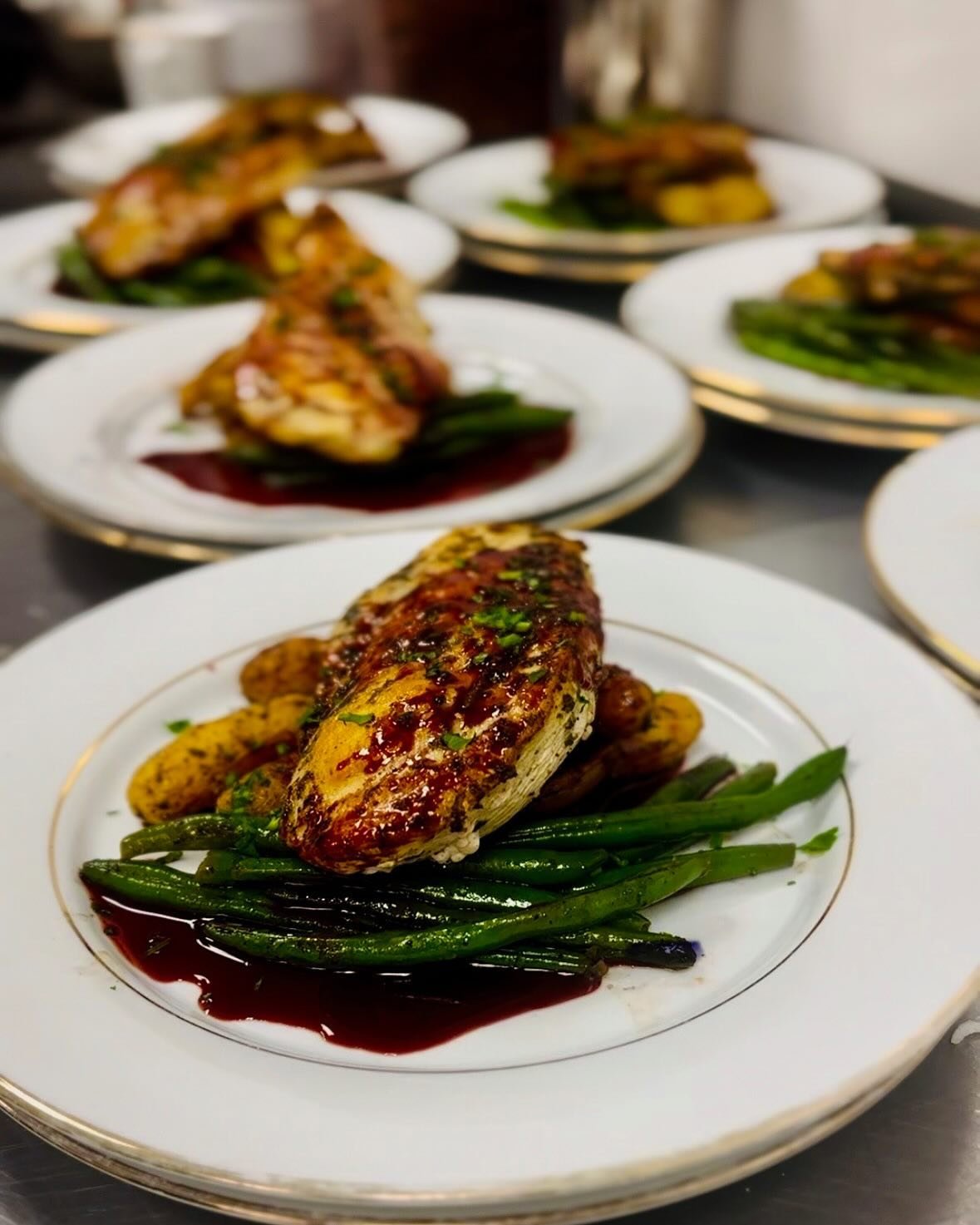 We had the honor of providing a plated dinner service for the newest board members of the Tennessee Aquarium last night. The dishes pictured are: 1. roasted chicken with blackberry demi-glace, fingerling potatoes and haricot verts, and 2: coconut cur