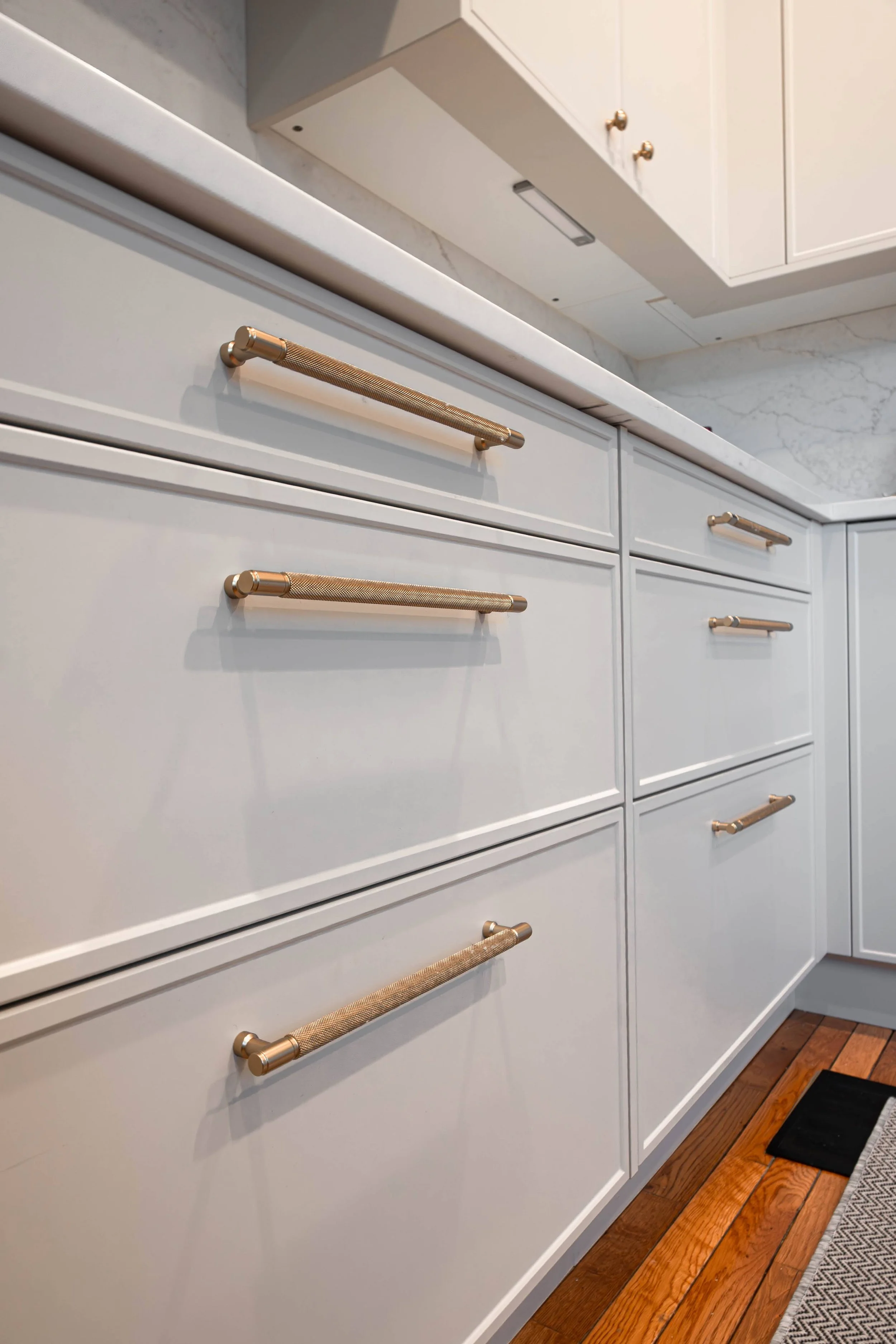 A close-up view of high-quality shaker style cabinetry, demonstrating the superior craftsmanship and texture typical of top-tier Chicago millwork.