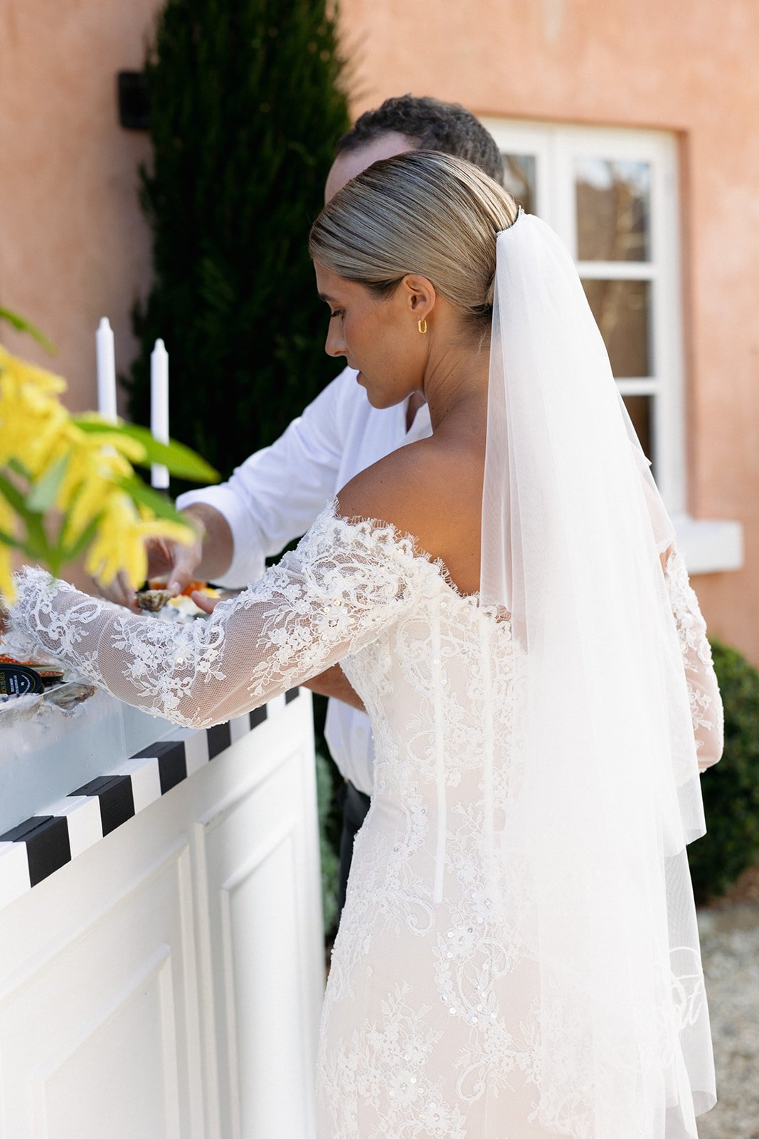 Wedding Event Catering - Bride enjoying oysters and caviar