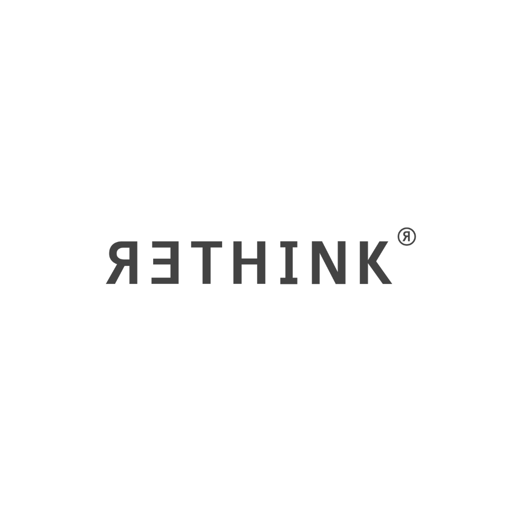The word 'Rethink' written in black, upside down on a white background.