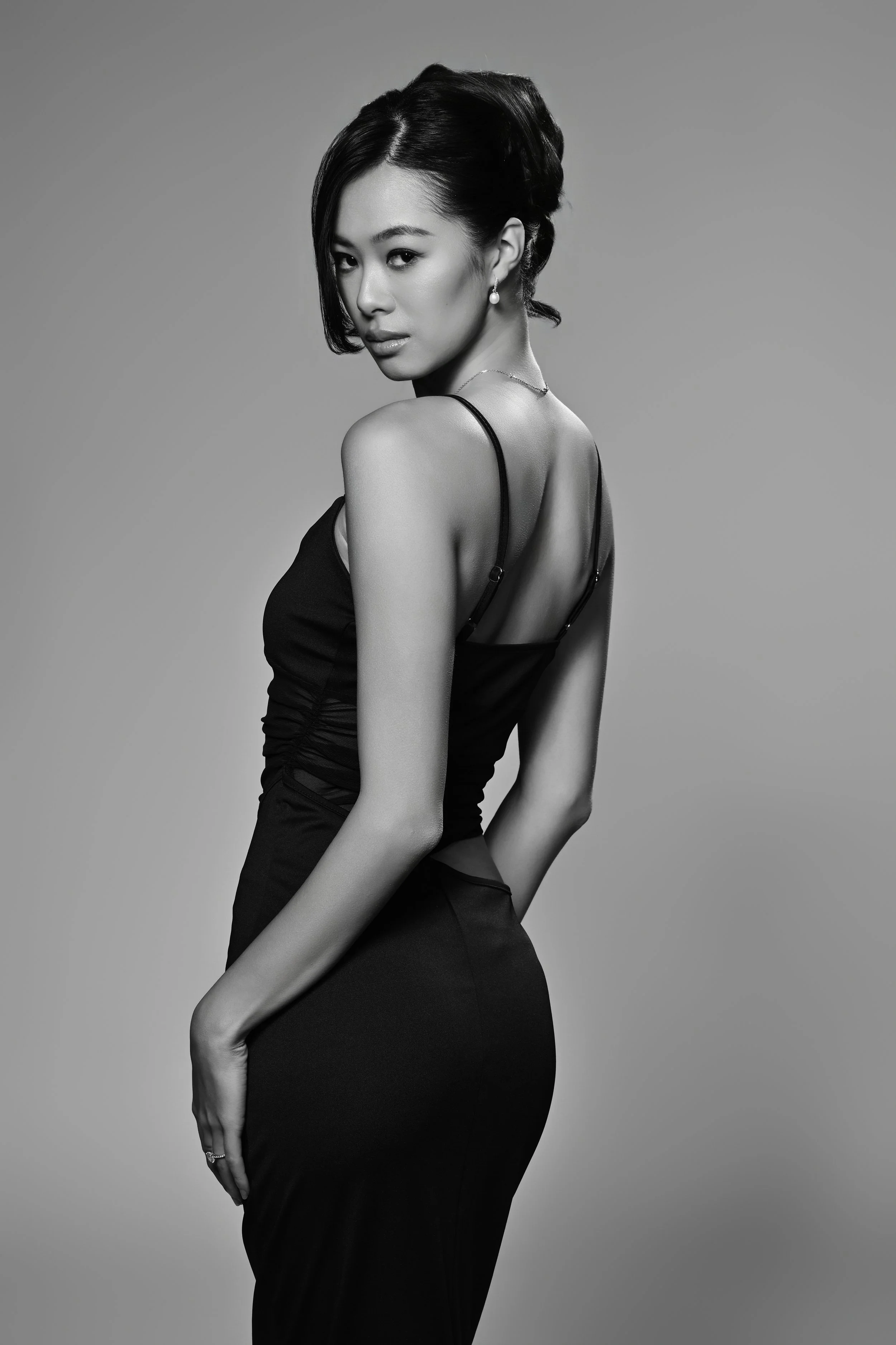 Portrait of a women in a elegant dress with a up hairdo