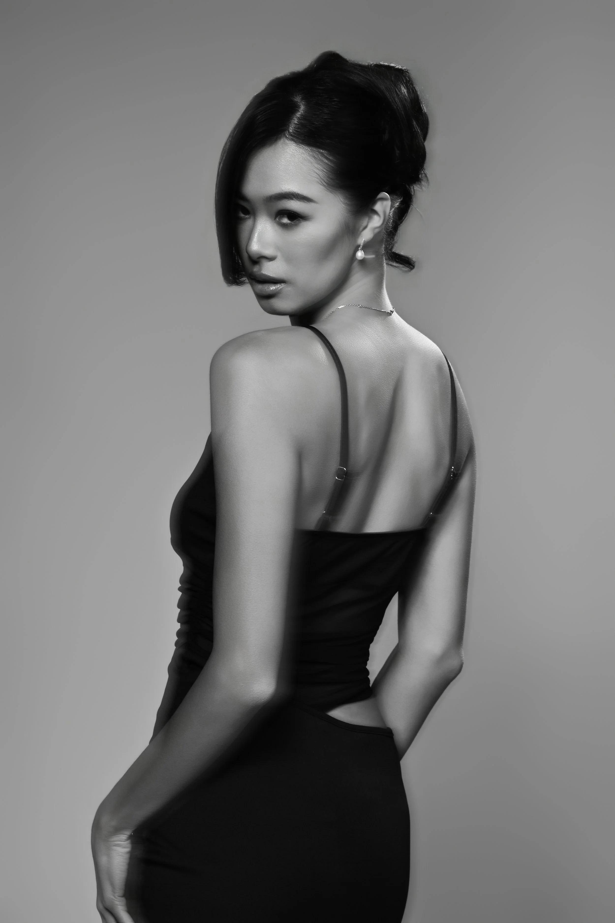 Portrait of a women in a elegant dress with a up hairdo
