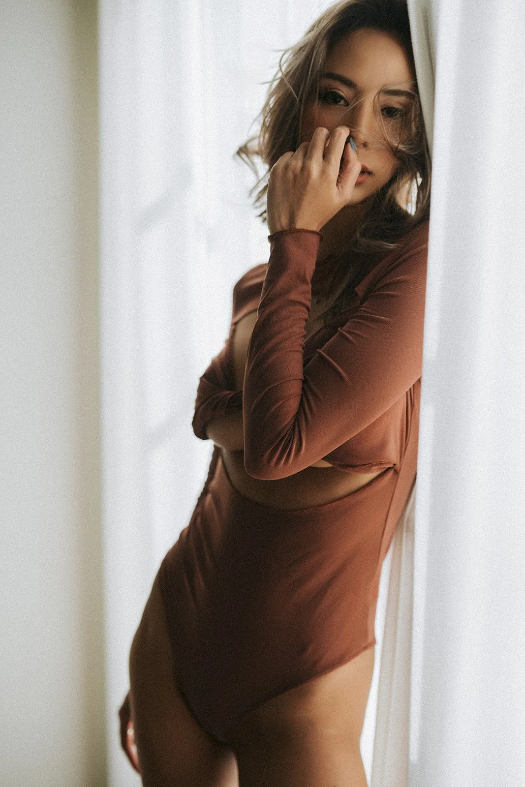 Editorial-style boudoir photography in Hong Kong, featuring high-end designer lingerie curated by Maison Kali