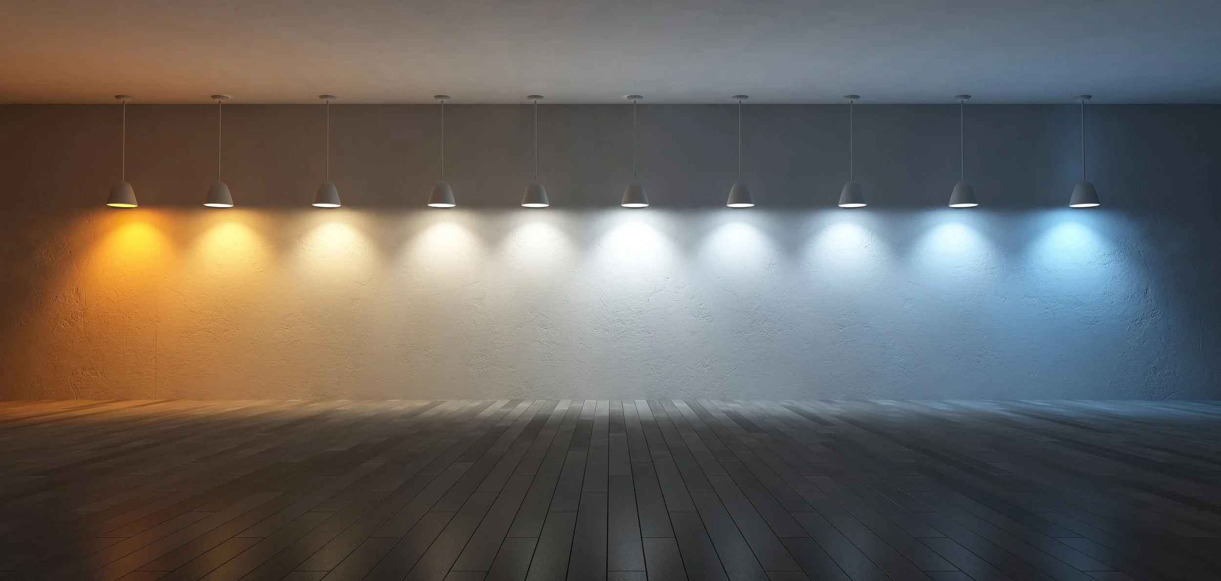 Interior lighting colour temperature comparison showing pendant lights transitioning from warm amber 2700K lighting to neutral white and cool blue-toned 5000K lighting.