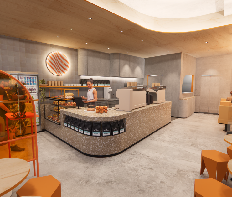Modern coffee shop with a barista preparing drinks behind a marble counter, orange chairs, a display case with baked goods, and a light wood ceiling.