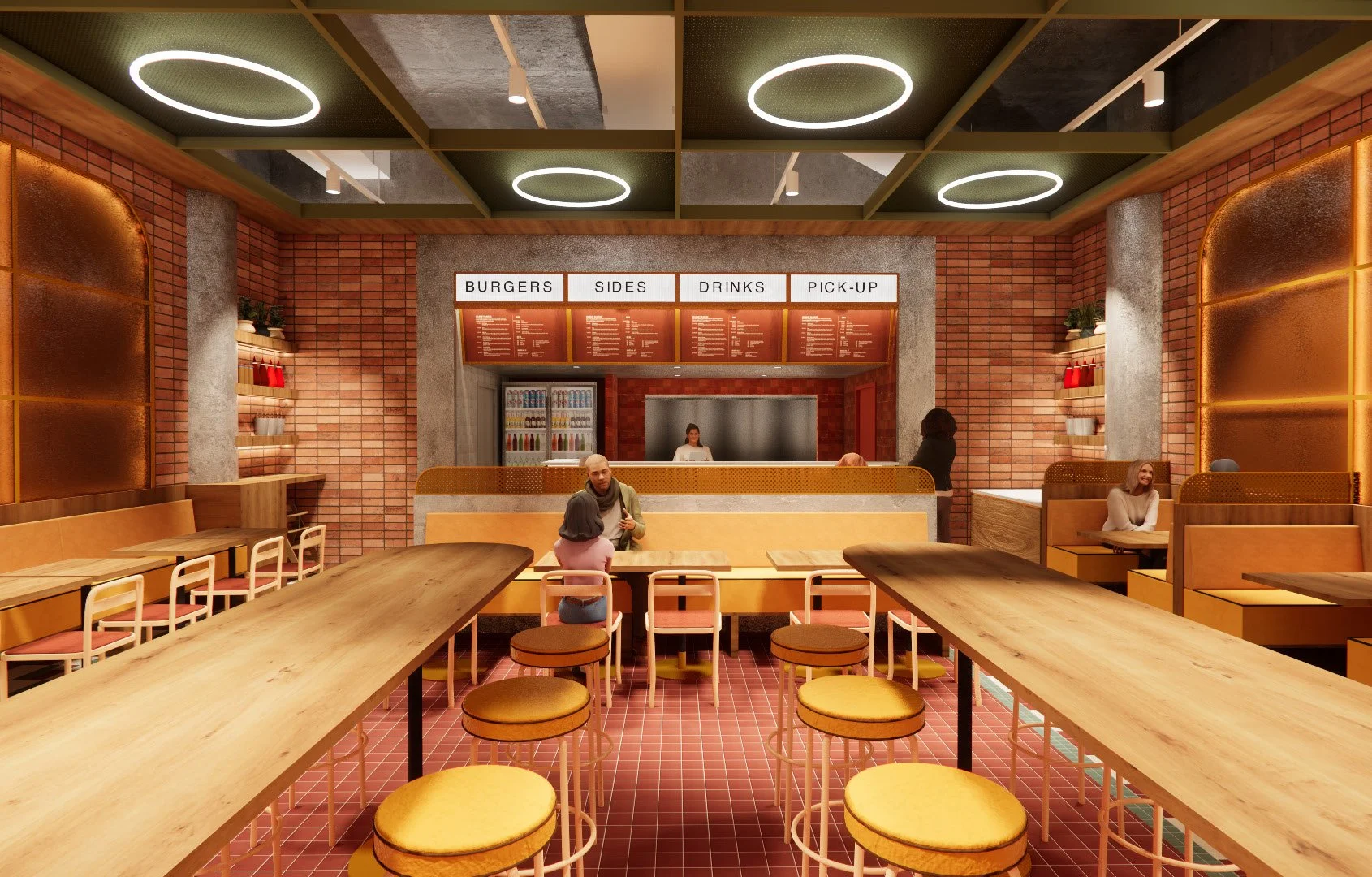Interior of a modern burger restaurant with wooden tables and chairs, a brick wall, and a menu board above the counter that reads Burgers, Sides, Drinks, Pick-Up. There are a few customers sitting and ordering at the counter.