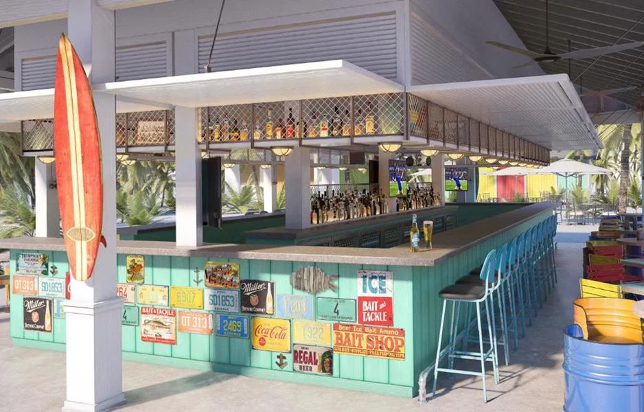 Beachside bar with turquoise wood paneling, surfboard decoration, and colorful chairs, decorated with vintage license plates and signs.