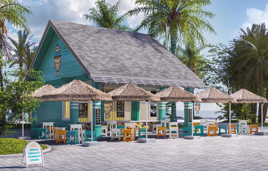 Colorful ice cream shop with a tropical theme, featuring a blue building, thatched umbrellas, and outdoor seating and palm trees
