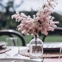 Soft floral details on a wedding table at Mason Winery