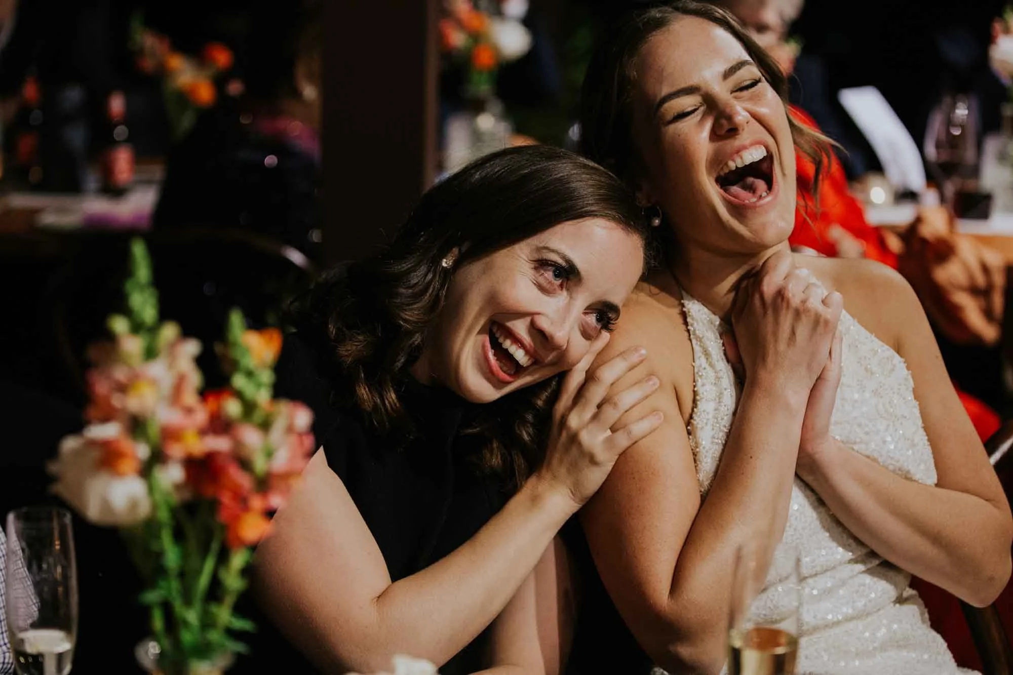 Wedding guests sharing a joyful moment at Mason Winery