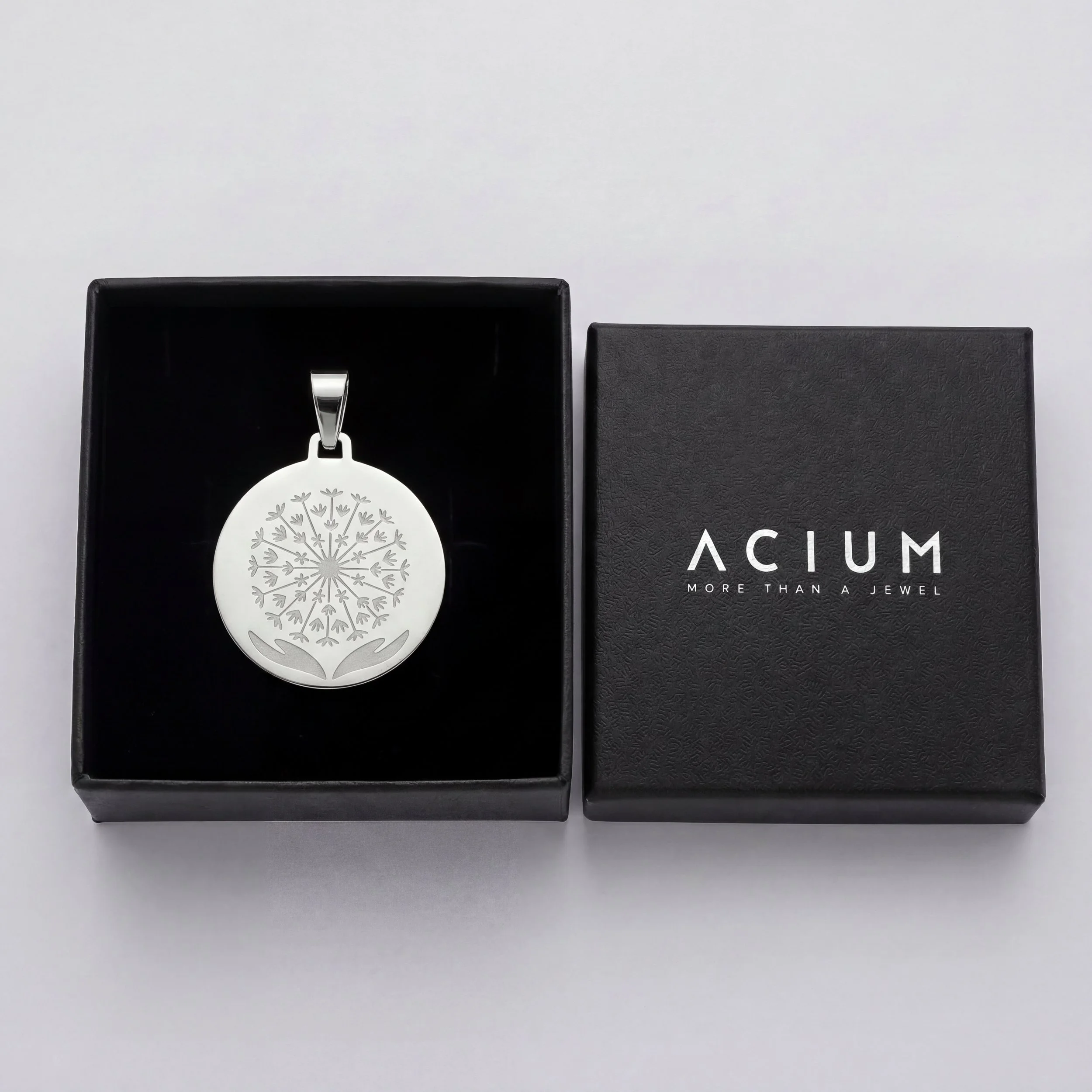 Medalla pequeña plateada