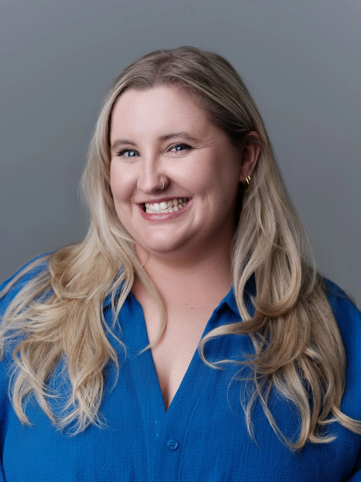 minimax-headshot-blue-shirt-smiling.jpg