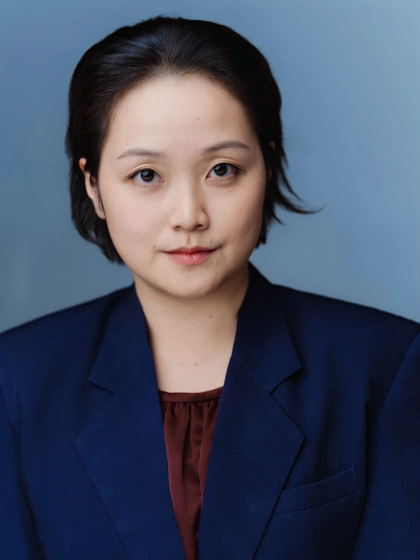minimax-headshot-navy-blazer.jpg