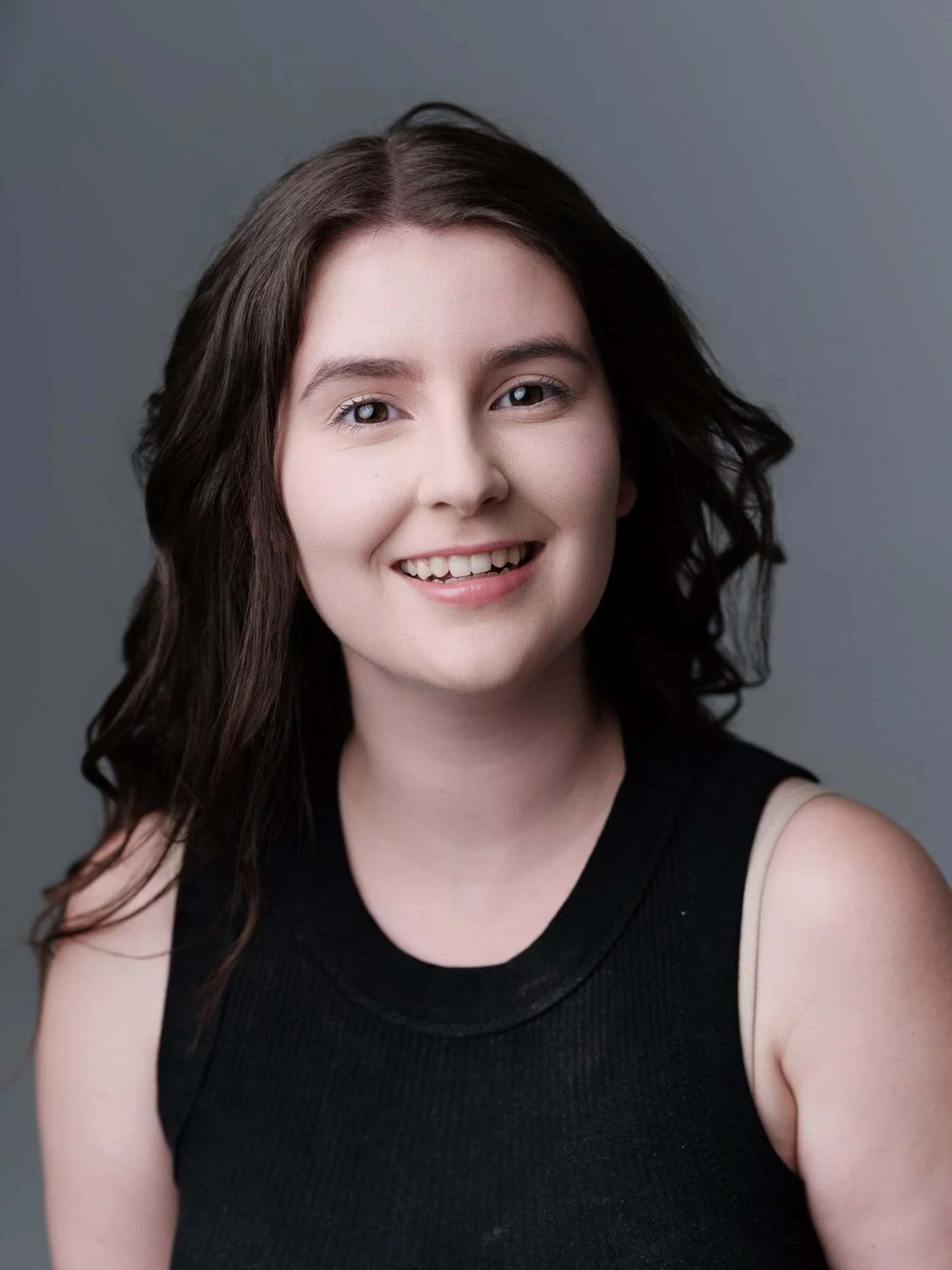 minimax-headshot-black-tank-smiling.jpg