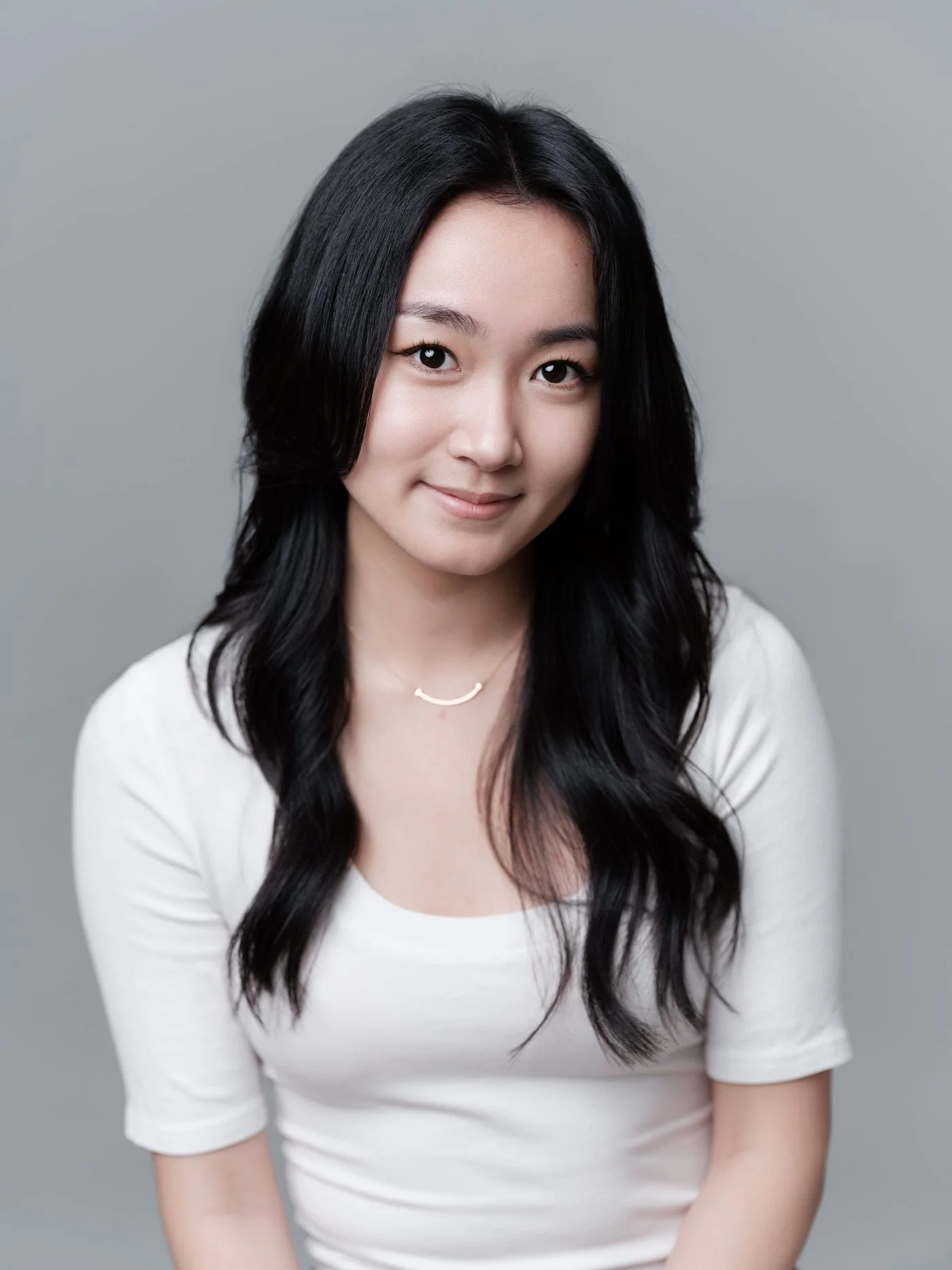 minimax-headshot-white-tee-long-hair.jpg