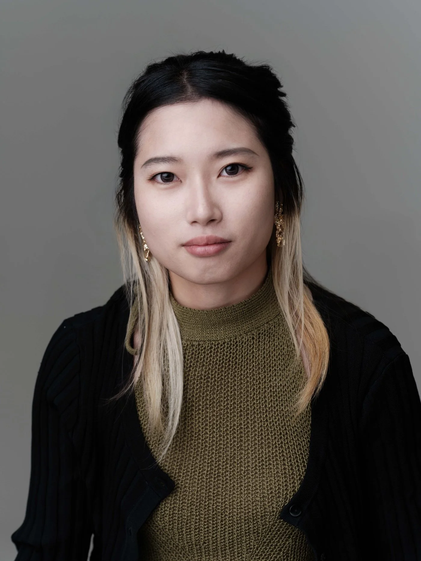 minimax-headshot-olive-knit.jpg