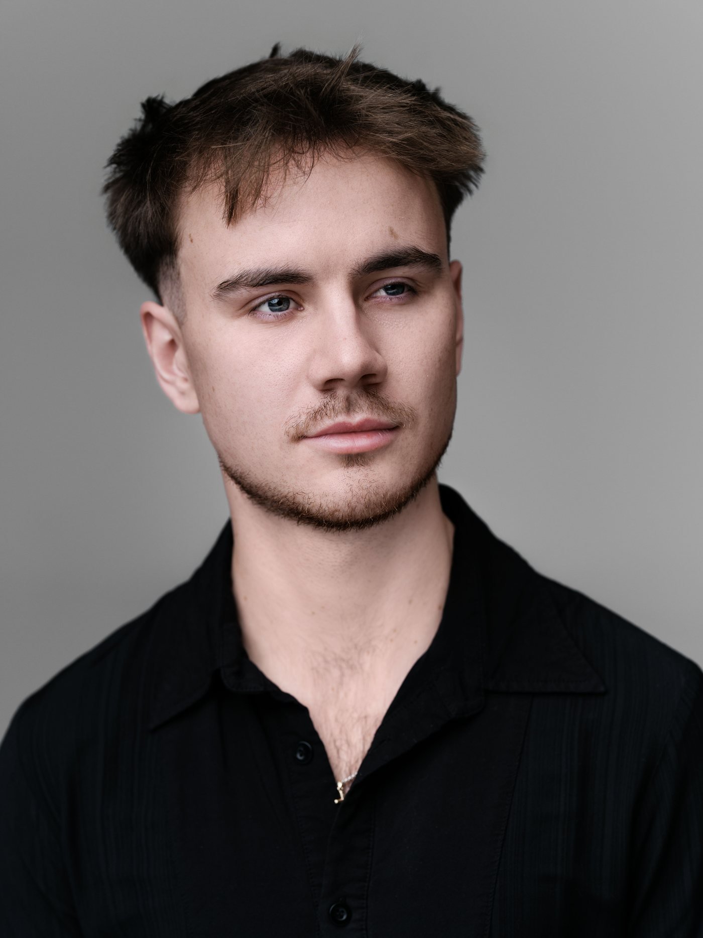 minimax-headshot-black-shirt-short-hair.jpg