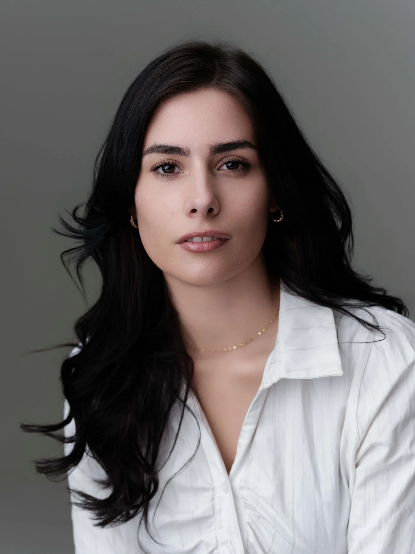 minimax-headshot-white-shirt-open.jpg