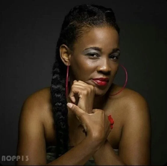 black woman with large natural braids
