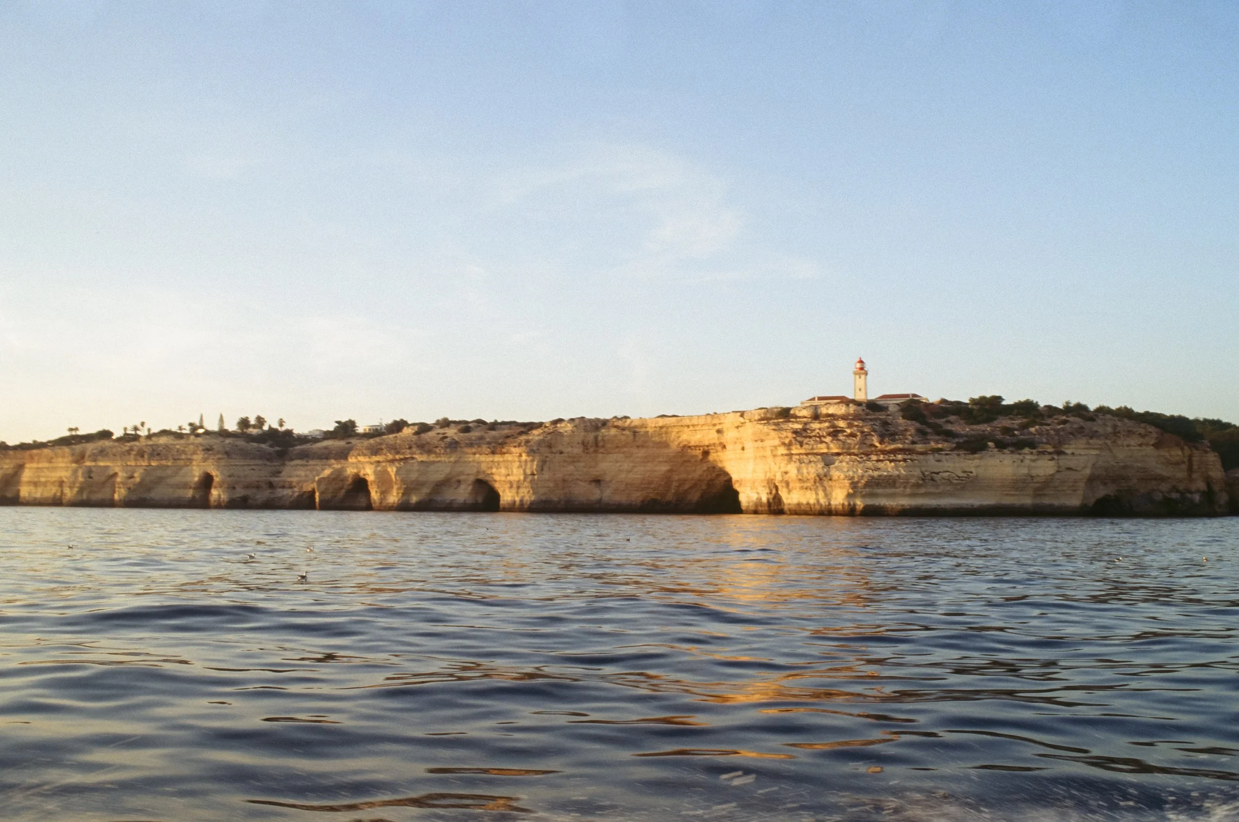 Warm golden hour light on Kodak Ektachrome film in Algarve, Portugal, showing rich yellow and orange tones without blue cast.