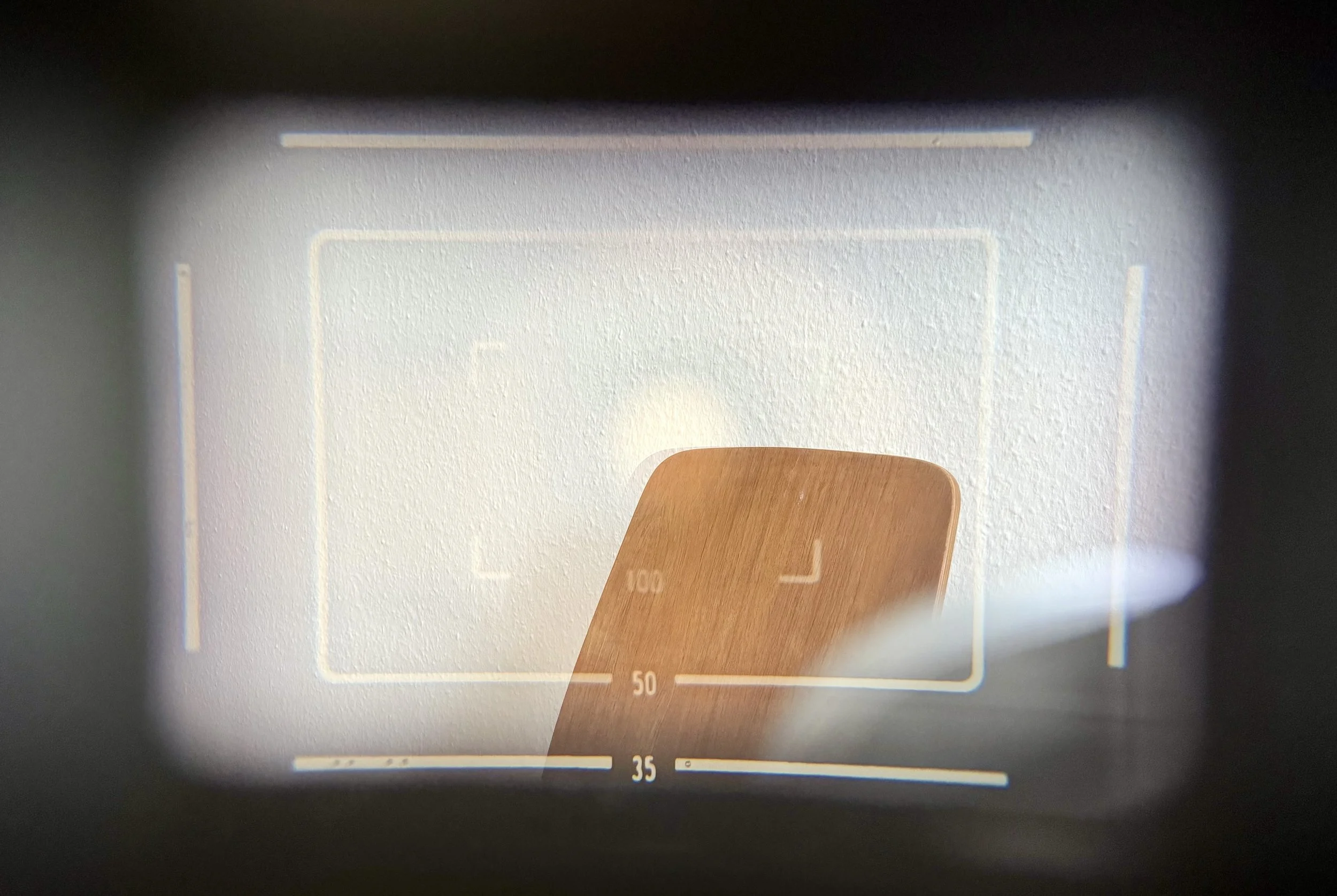 View through the Canon P's viewfinder. If you shoot without glasses this is what you'll see. If you wear glasses you will very likely not see the 35mm framlines.