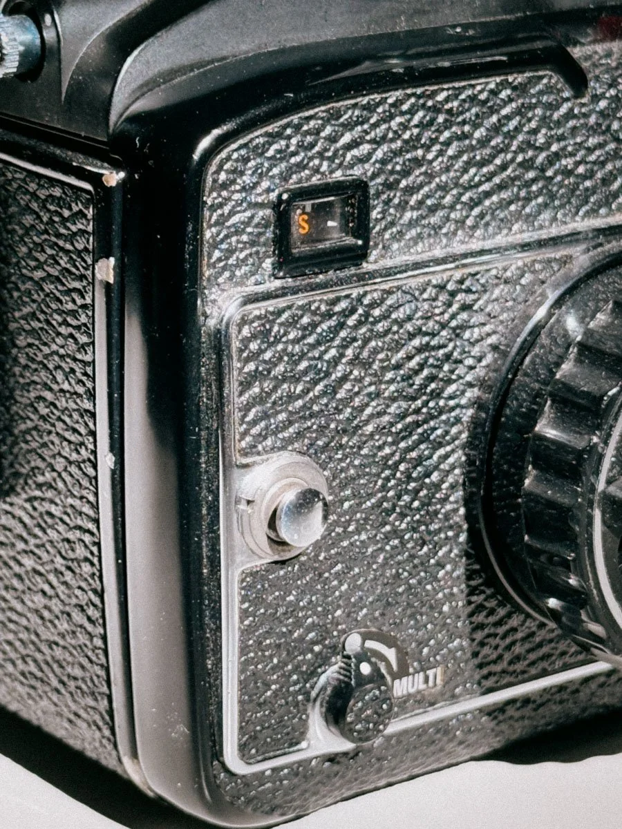 The Multi Exposure lever and Strap Attachement of the Mamiya M645