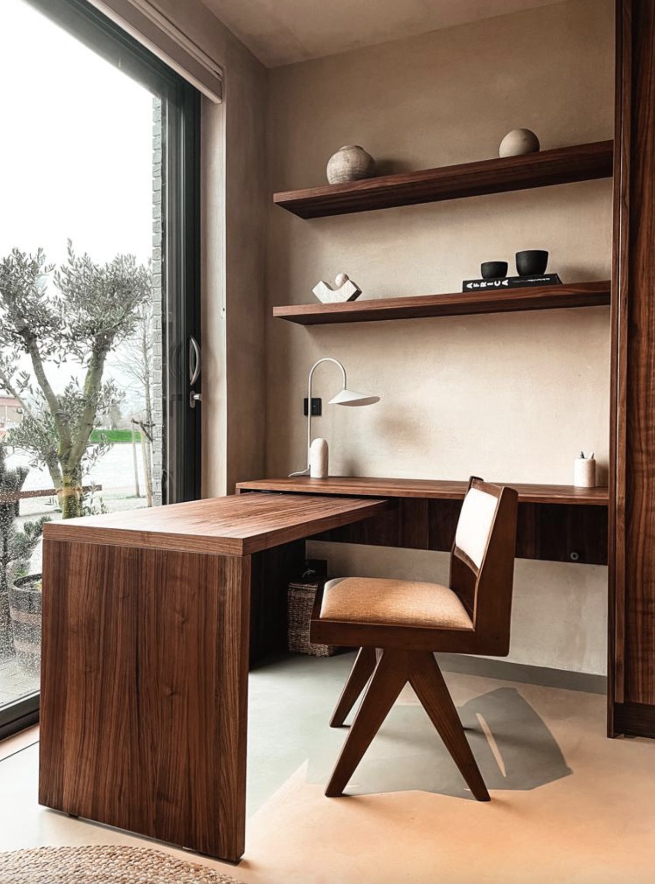 rammed earth wall with clay stucco