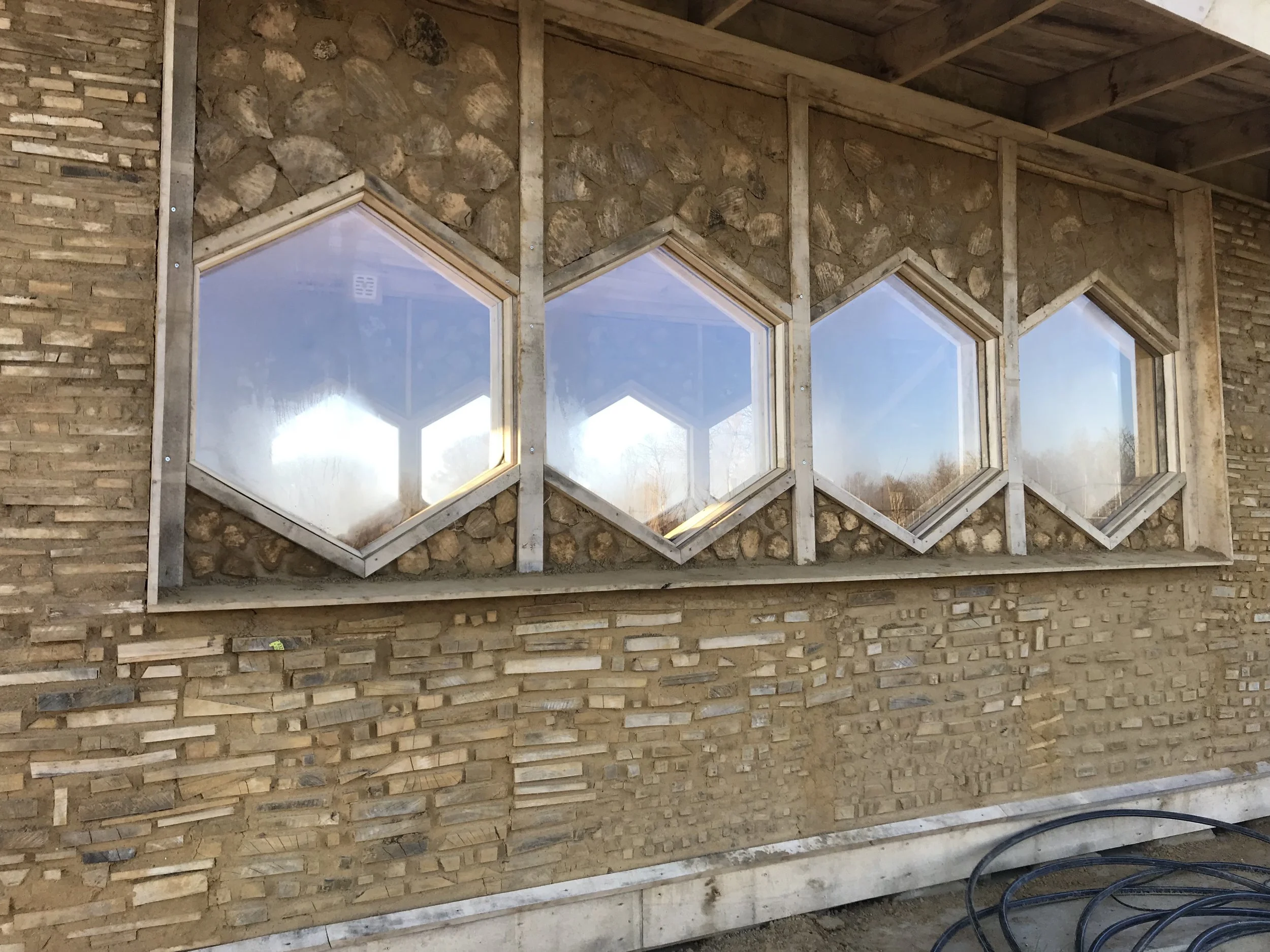 earthen render cord wood