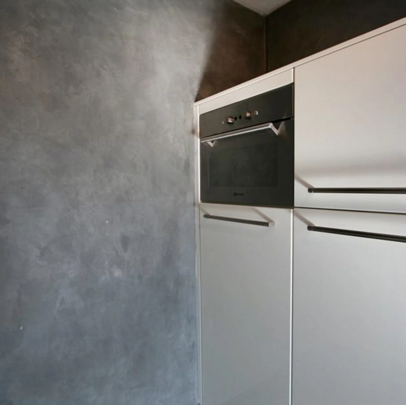 rammed earth under concrete look