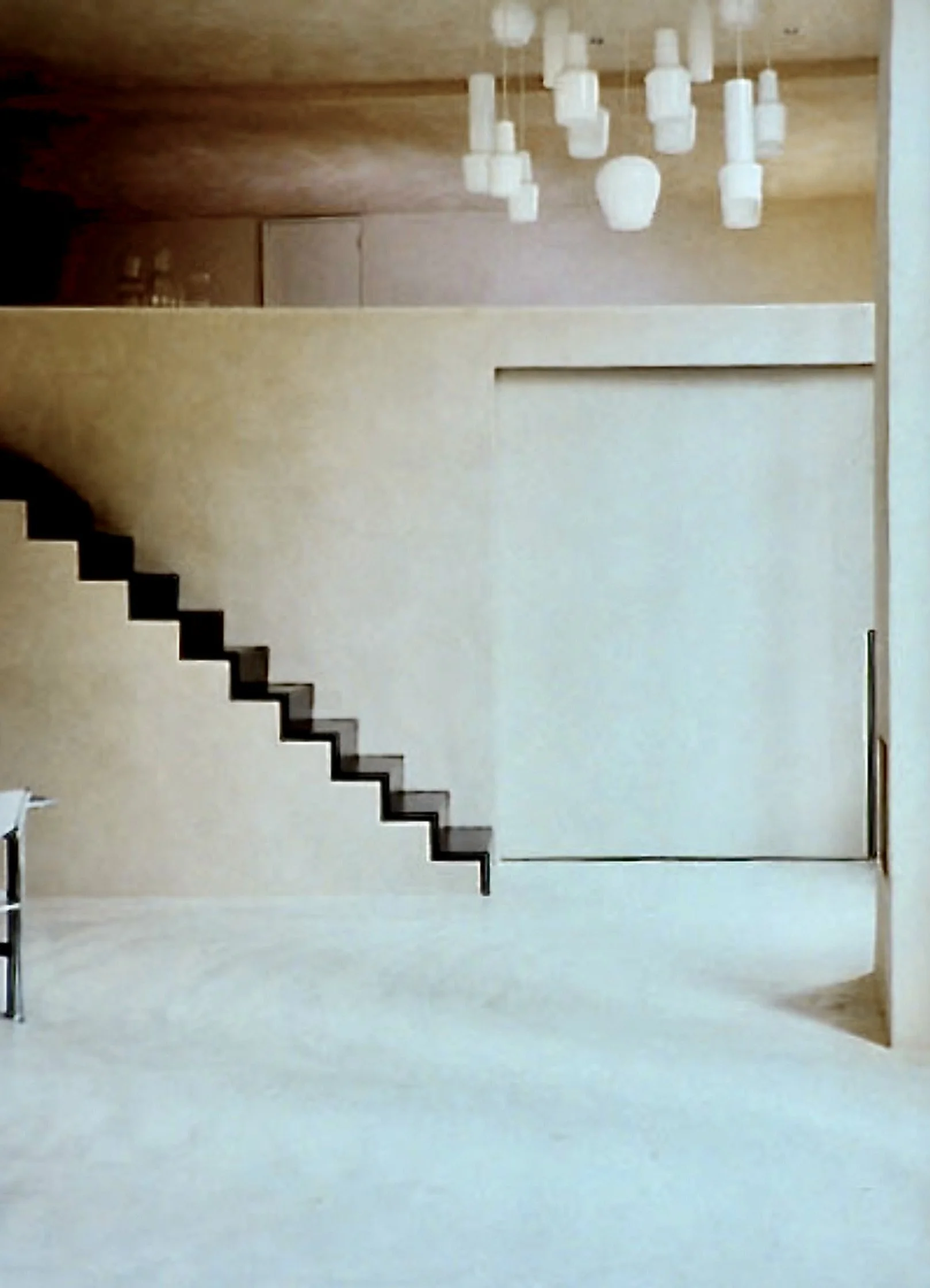 earth plaster stairs going up