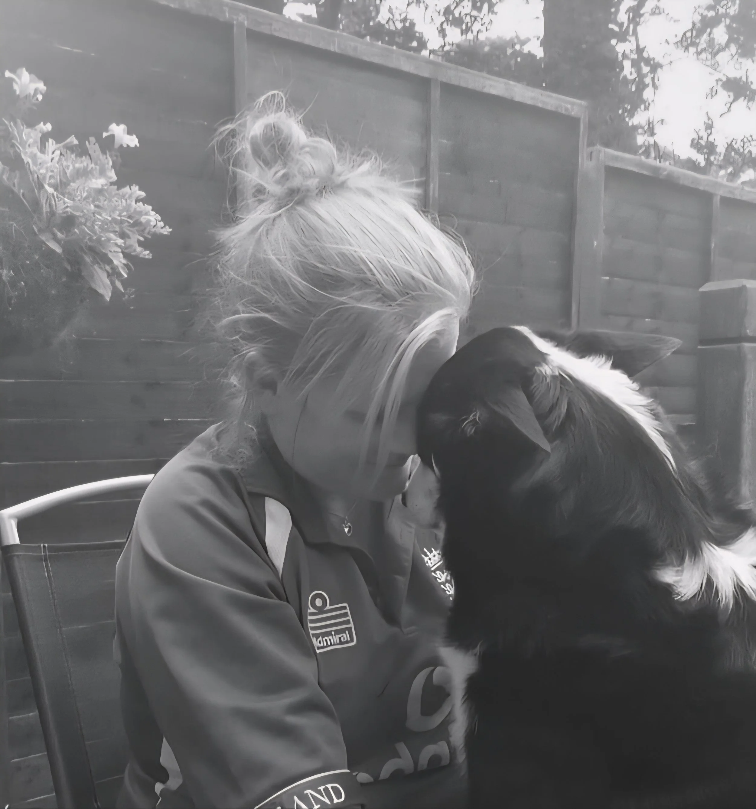 Emma our dog groomer, having a cuddle with her collie.