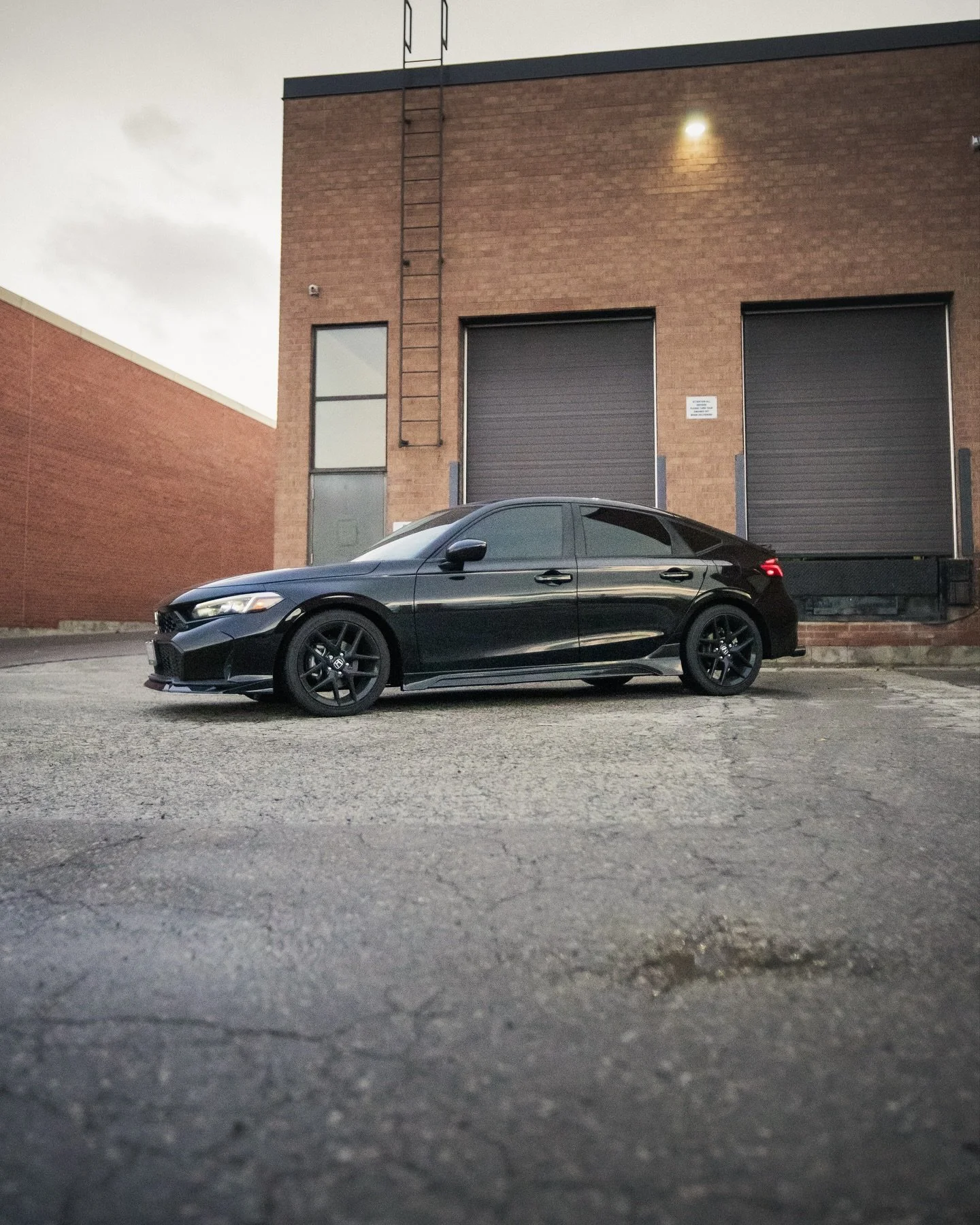 Stealth Mode ACTIVATED ✅
Full AERO: Front Lip, Paint Matched Side Skirts, Rear Diffuser
With Rain Light + Custom Quad Tip Exhaust

Transformation complete on this Civic sport!
What a change! 
DM or CALL us for yours today!!
📥📞

▫️Rims 
▫️Powder Coa