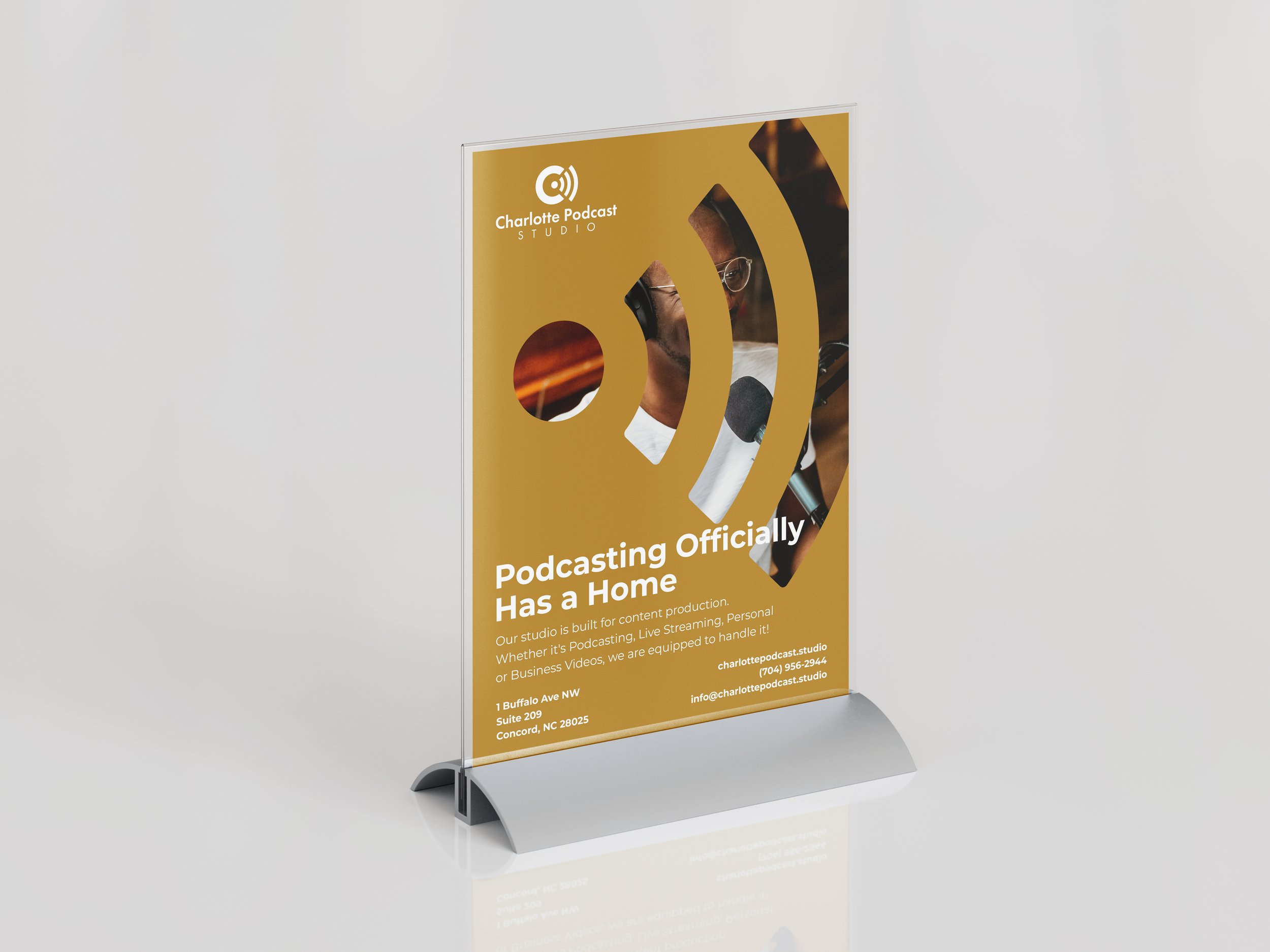 Charlotte-Podcast-Studio_Free_Desk_Stand_Mockup_1_Three.jpg