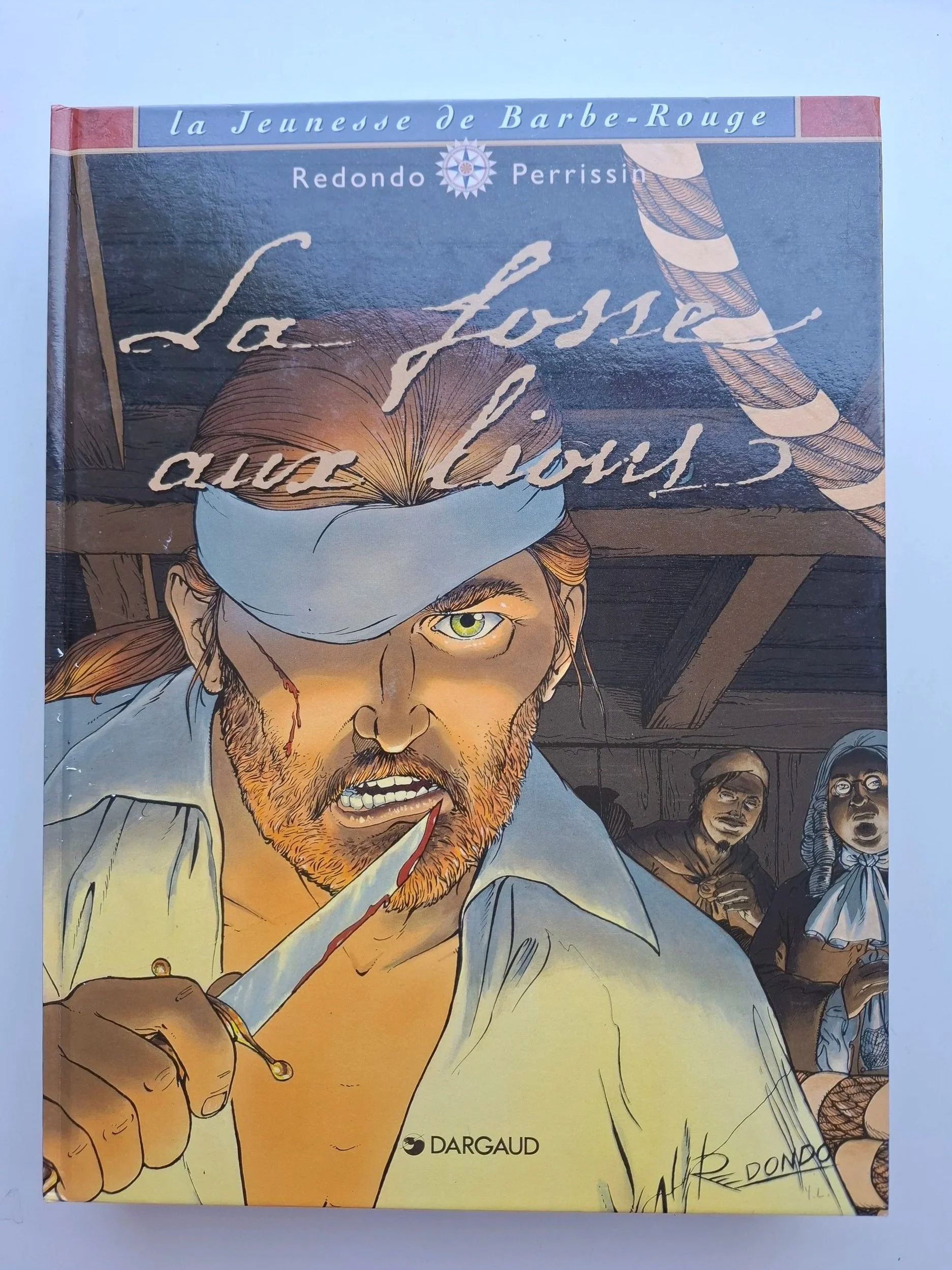 LA JEUNESSE DE BARBE-ROUGE TOME 2 "LA FOSSE AUX LIONS" EO 1997