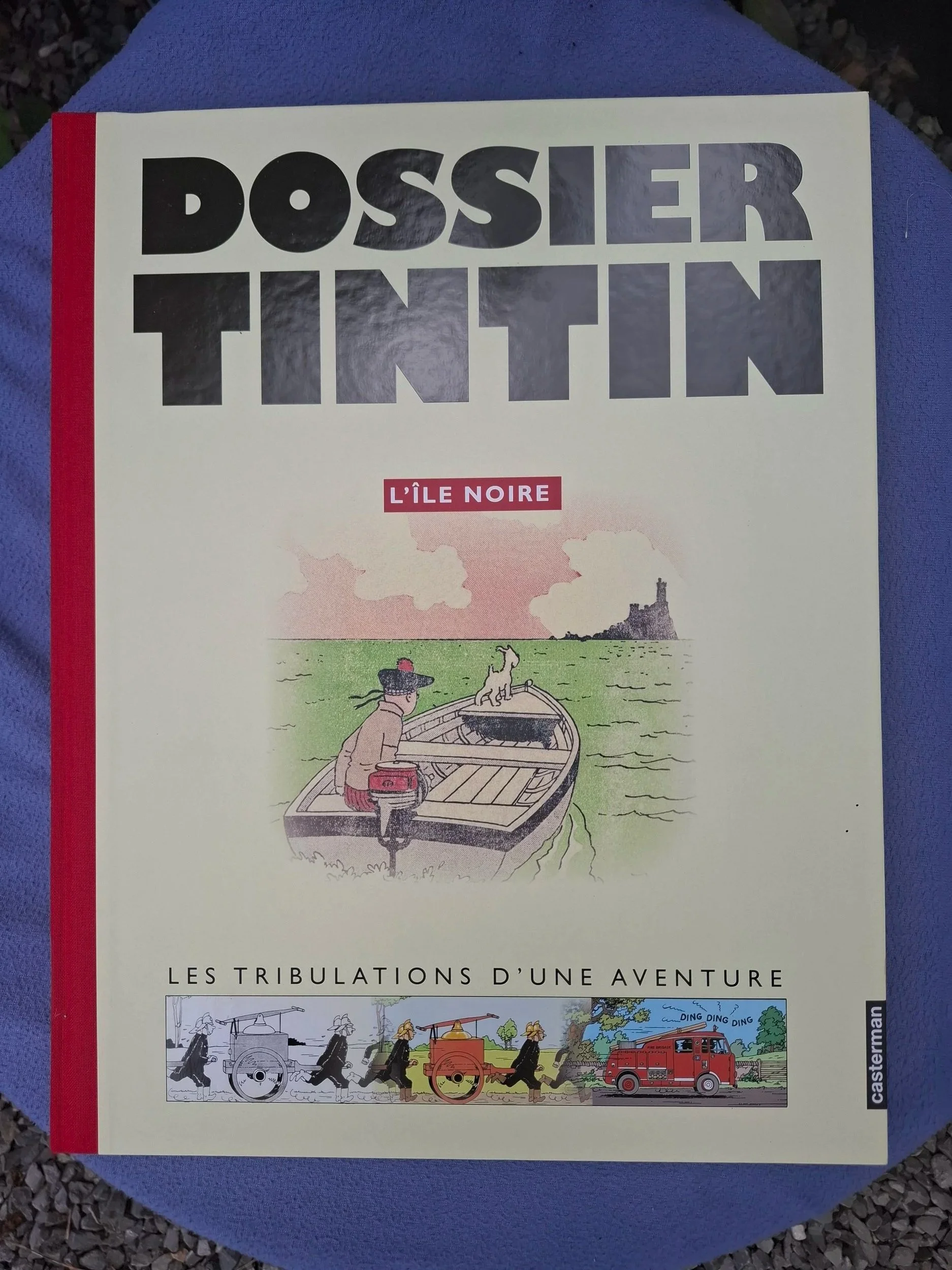 DOSSIER TINTIN "L'ILE NOIRE" CASTERMAN DOS TOILE EO 2005