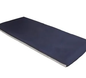 A black cushion or pad placed on a flat surface.