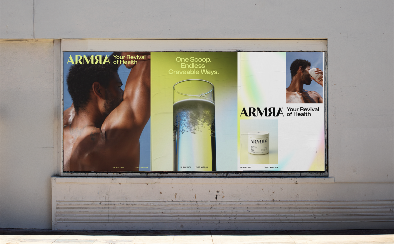 A large advertisement poster on a building wall featuring two images of a man, one shirtless with an arm raised and the other drinking from a cup, promoting ARMA's health products. The central image shows a tall glass of water with bubbles and reflec