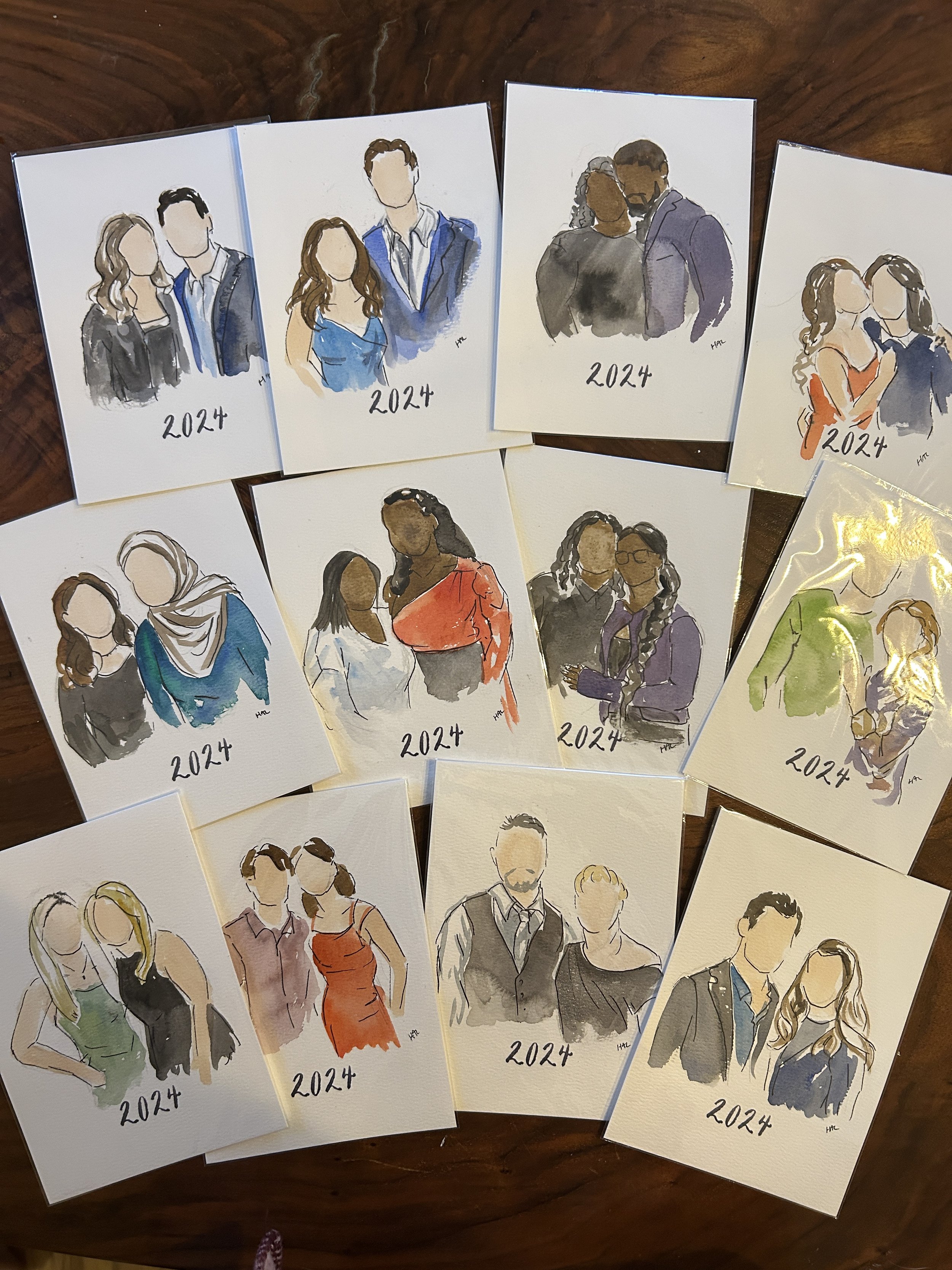 12 guest sketch drawings at the end of the night. Watercolor paper customized with the year.