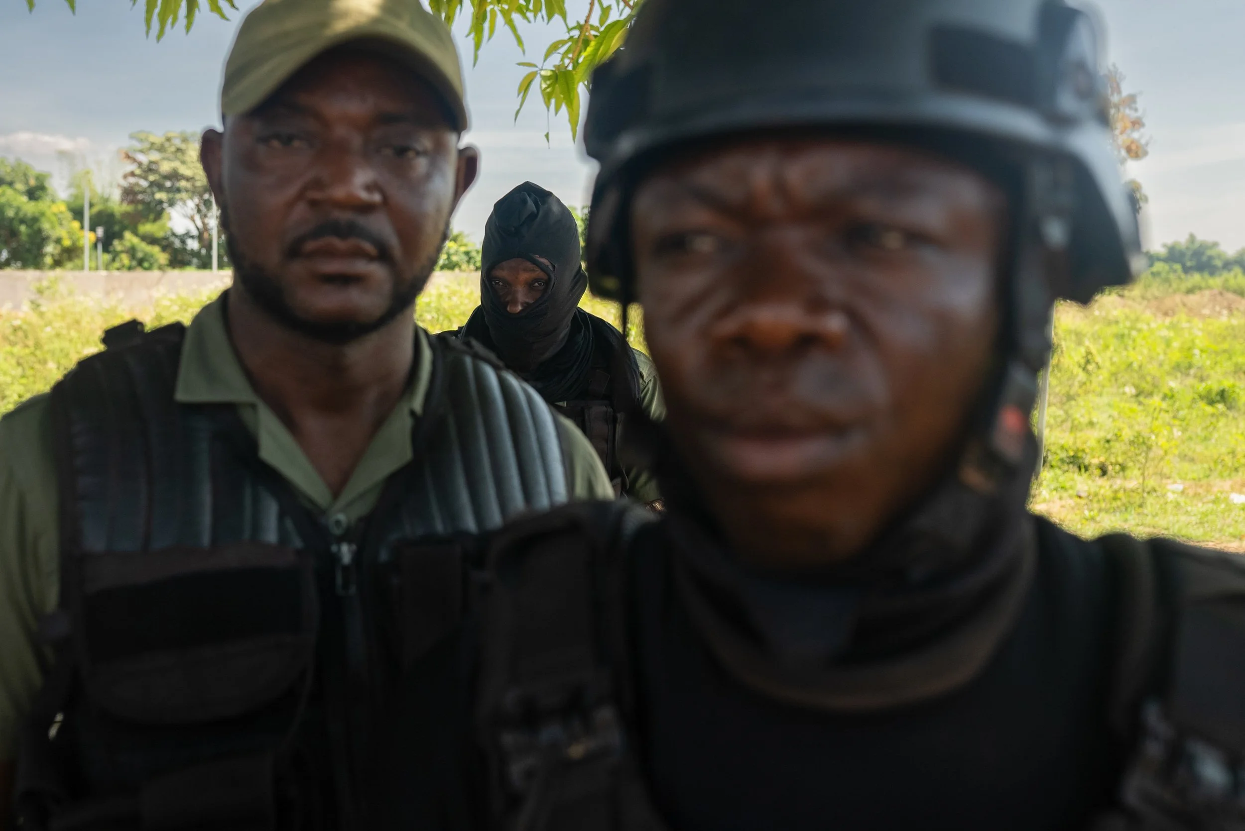 Fredo Joseph, 45, and other Protected Areas Surveillance Brigade (BSAP) agents stand guard at the Haitian-Dominican border.